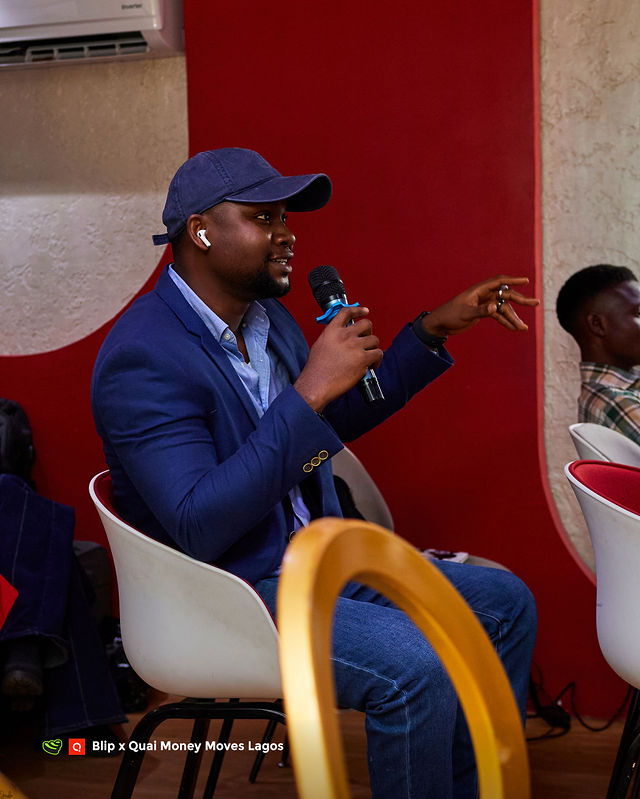 An attendee responding during Q&A at Money Moves Lagos