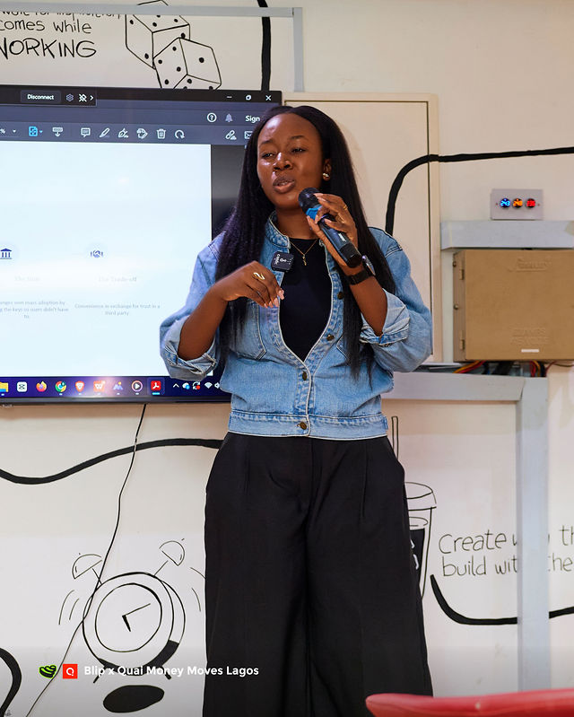 An attendee standing in the room at Money Moves Lagos