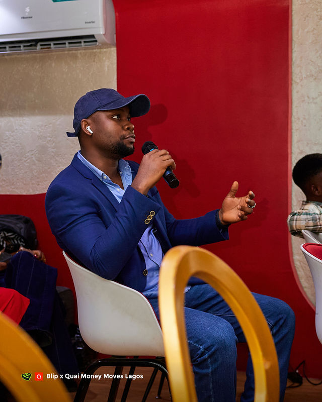 An attendee speaking during Q&A at Money Moves Lagos