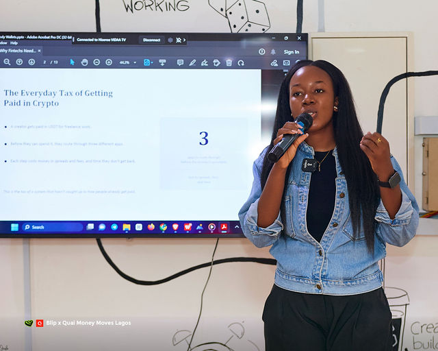 A member of the Blip and Quai team presenting on the cost of getting paid in crypto