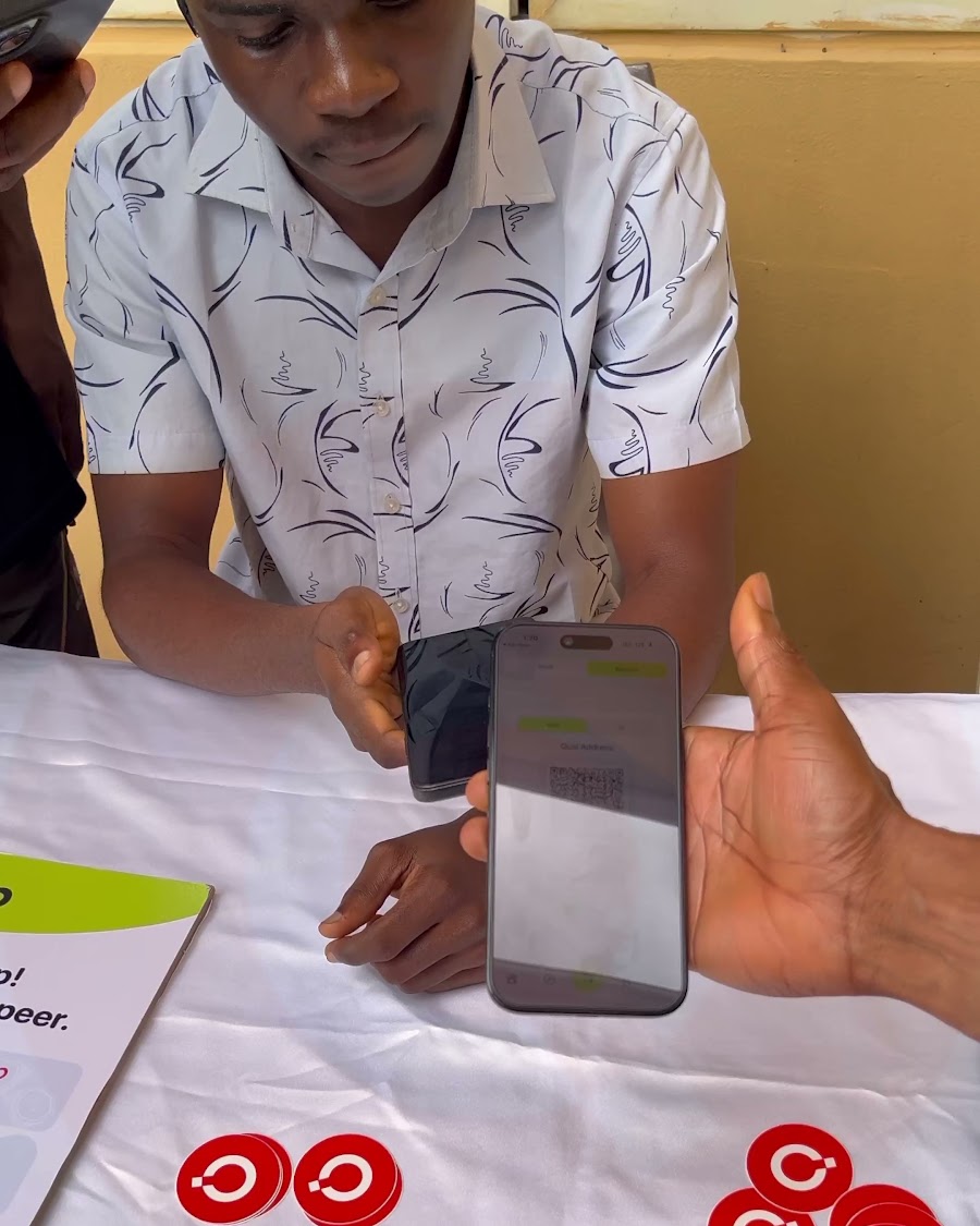 A live Blip wallet transaction being scanned phone to phone at Money Moves Uyo